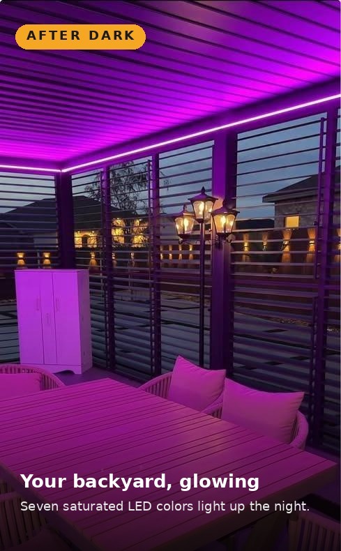 Motorized pergola glowing with pink LED lights at night in an Orlando backyard